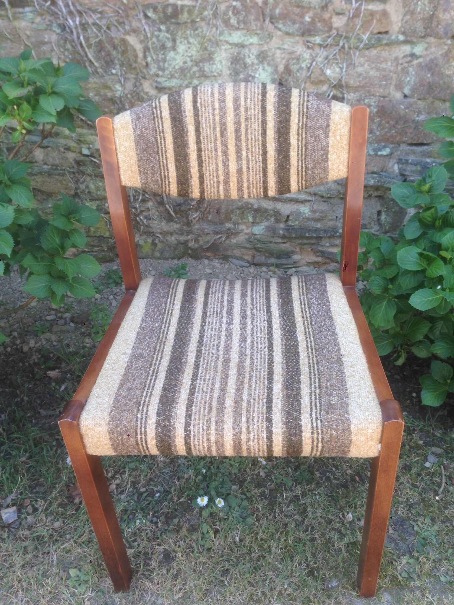 Vintage Scandinavian chairs in fabric and wooden footing.