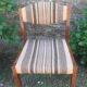 Vintage Scandinavian chairs in fabric and wooden footing.