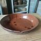 Large glazed earthenware dish