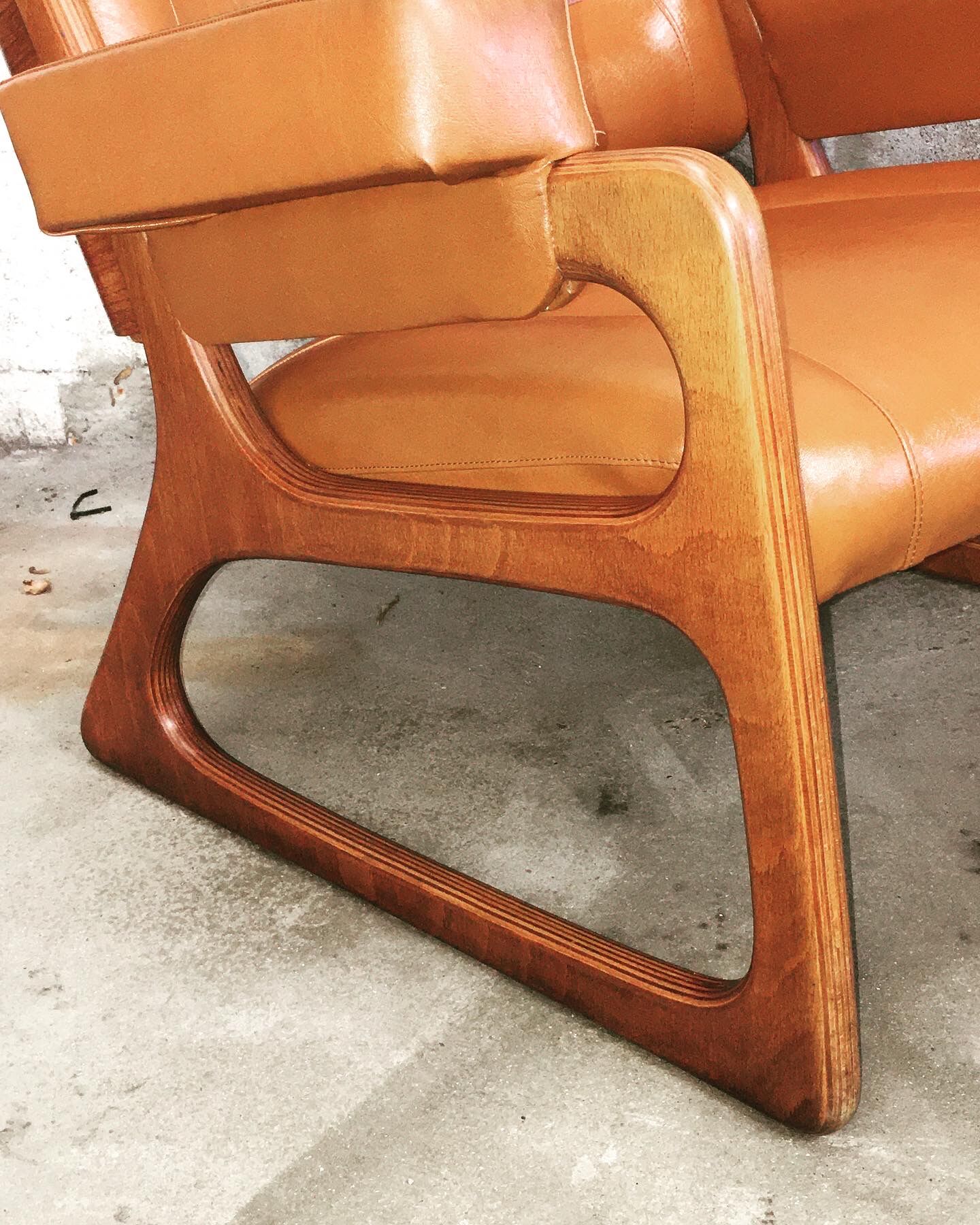 Armchair called "sled" Publisher Baumann and Ottoman