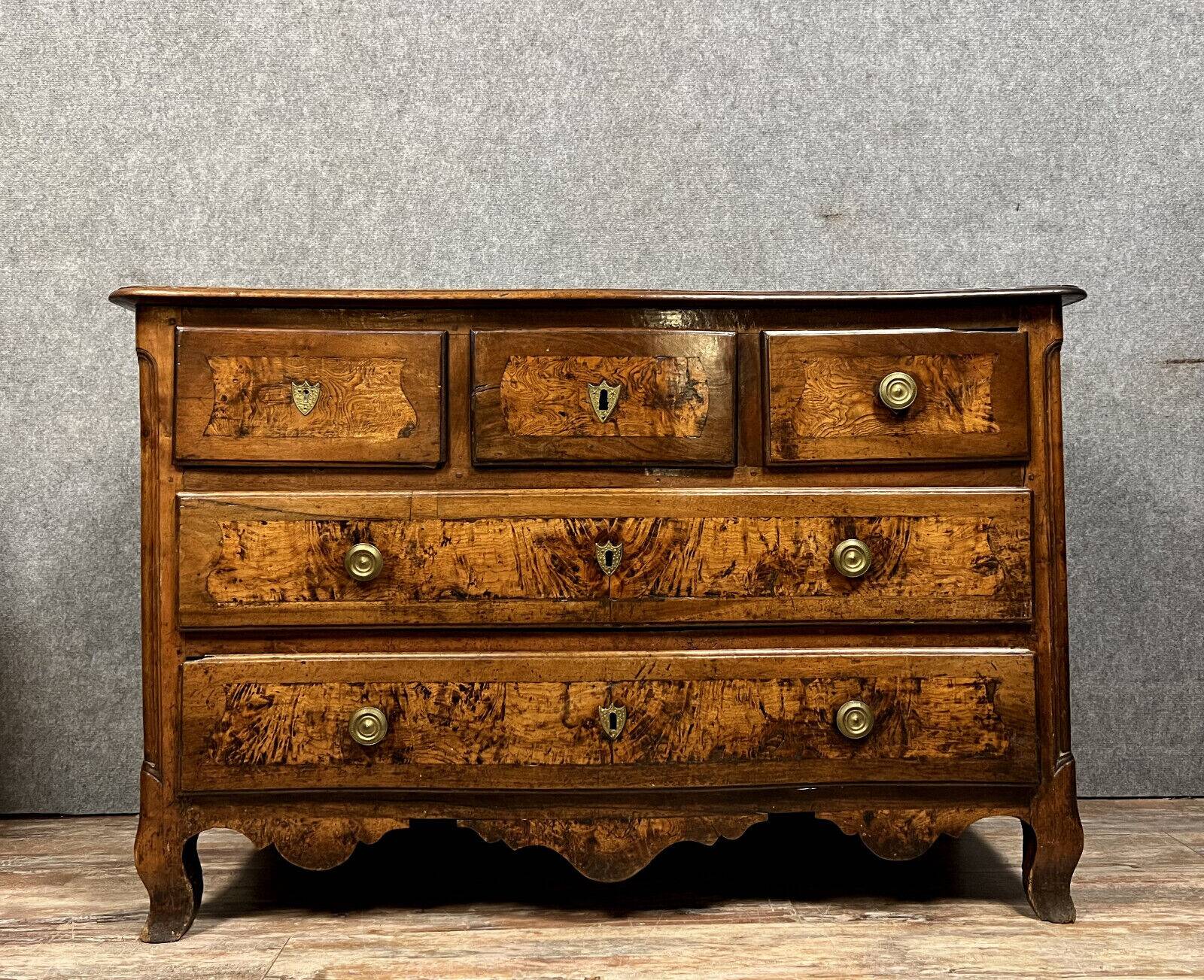 Louis XV period curved chest of drawers in walnut and elm burl circa 1750