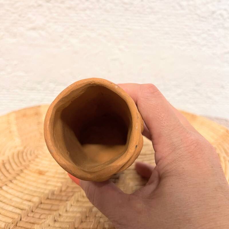 Face terracotta vase