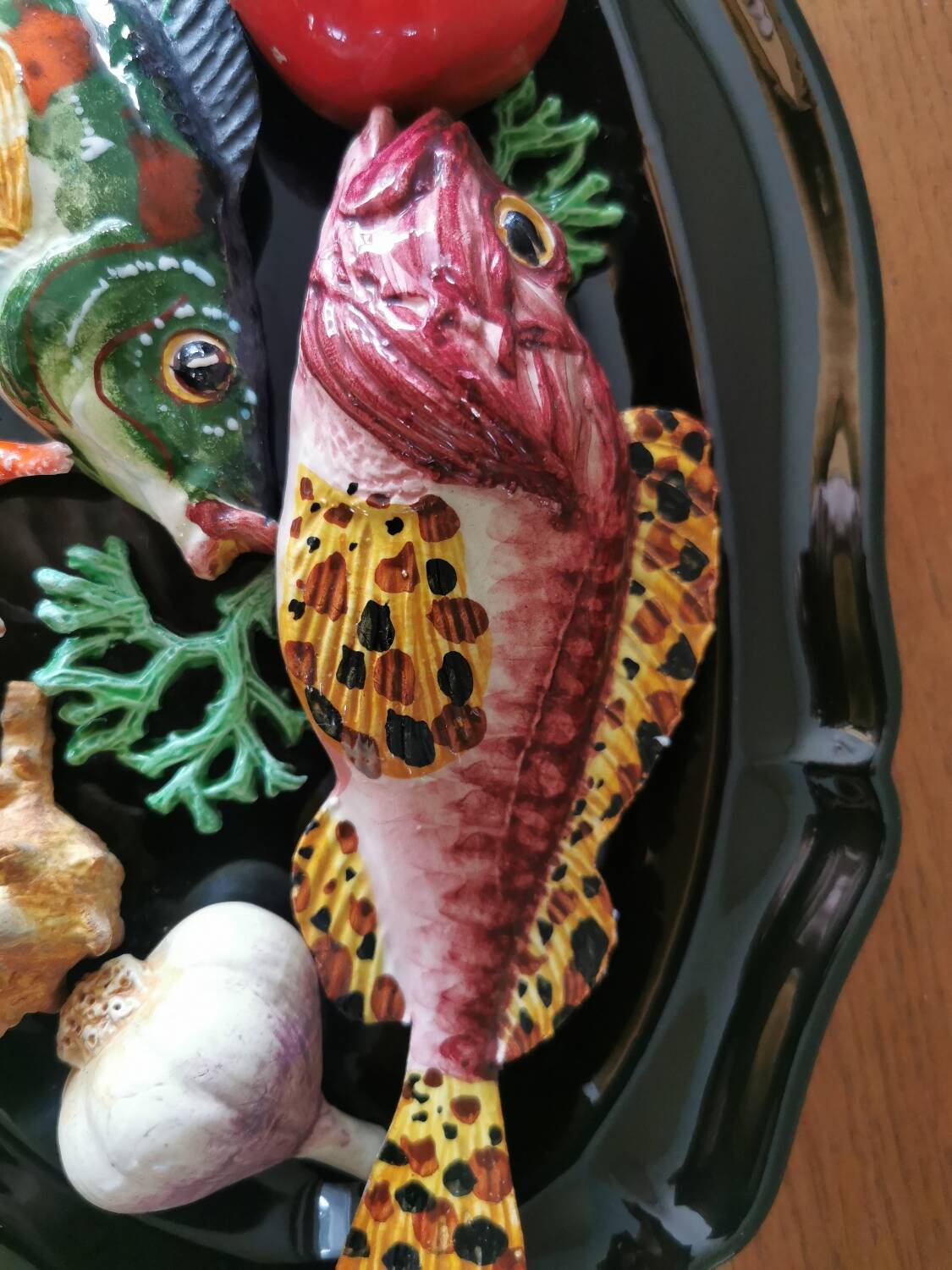 Vintage barbotine dish with fish decoration in relief