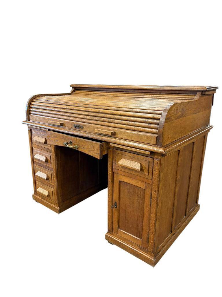 Vintage American desk made of solid wood with a curtain.