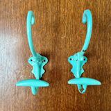 Pair of painted metal wall hooks