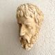 Plaster head to hang