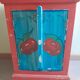 Painted wooden piece of furniture