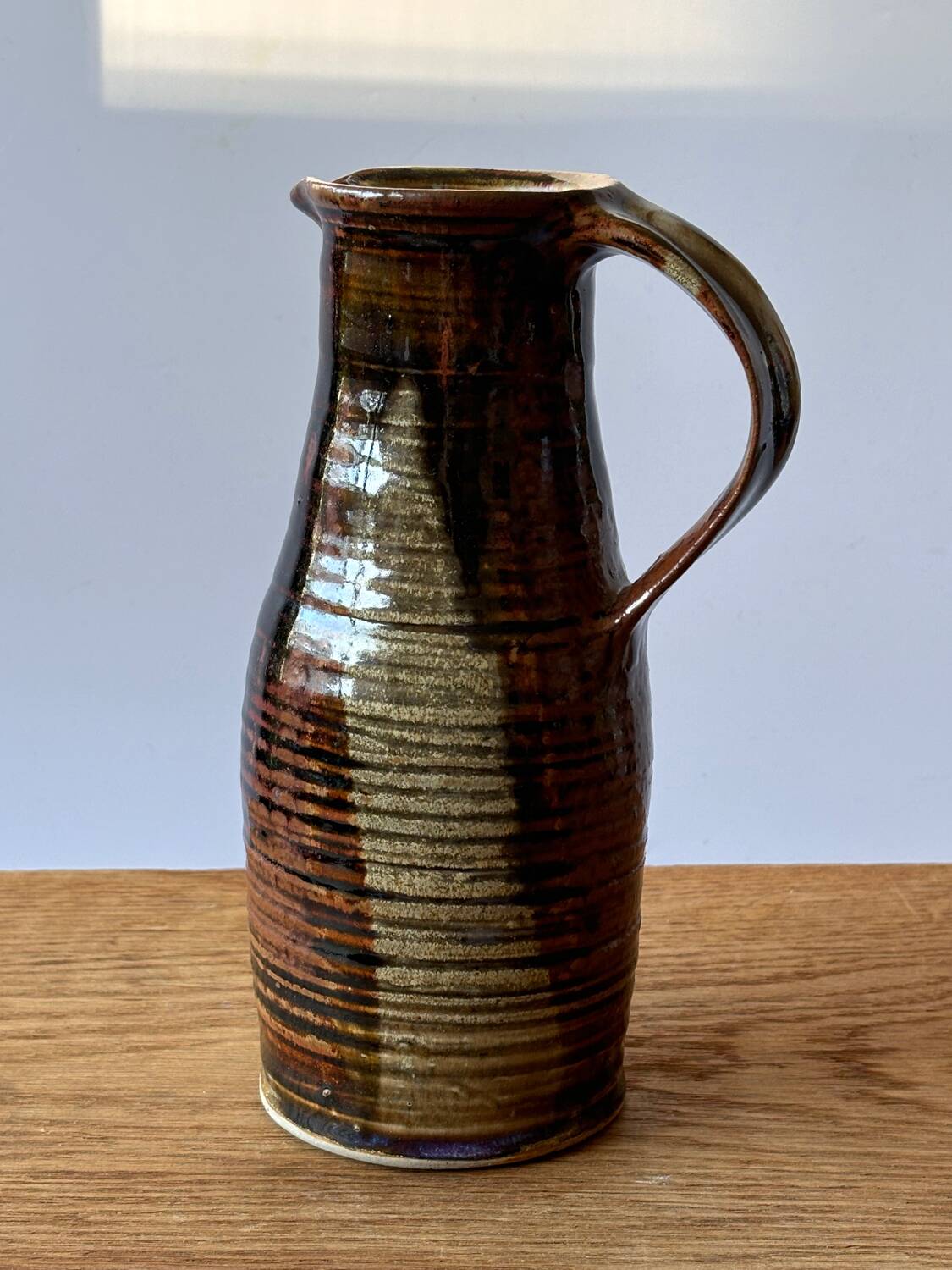 Vintage enameled stoneware pitcher