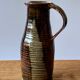 Vintage enameled stoneware pitcher