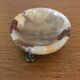 Alabaster pocket ashtray with 3 brass feet