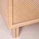 Rattan and brass sideboard