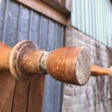 Antique farmhouse table in solid cherry wood with turned legs.