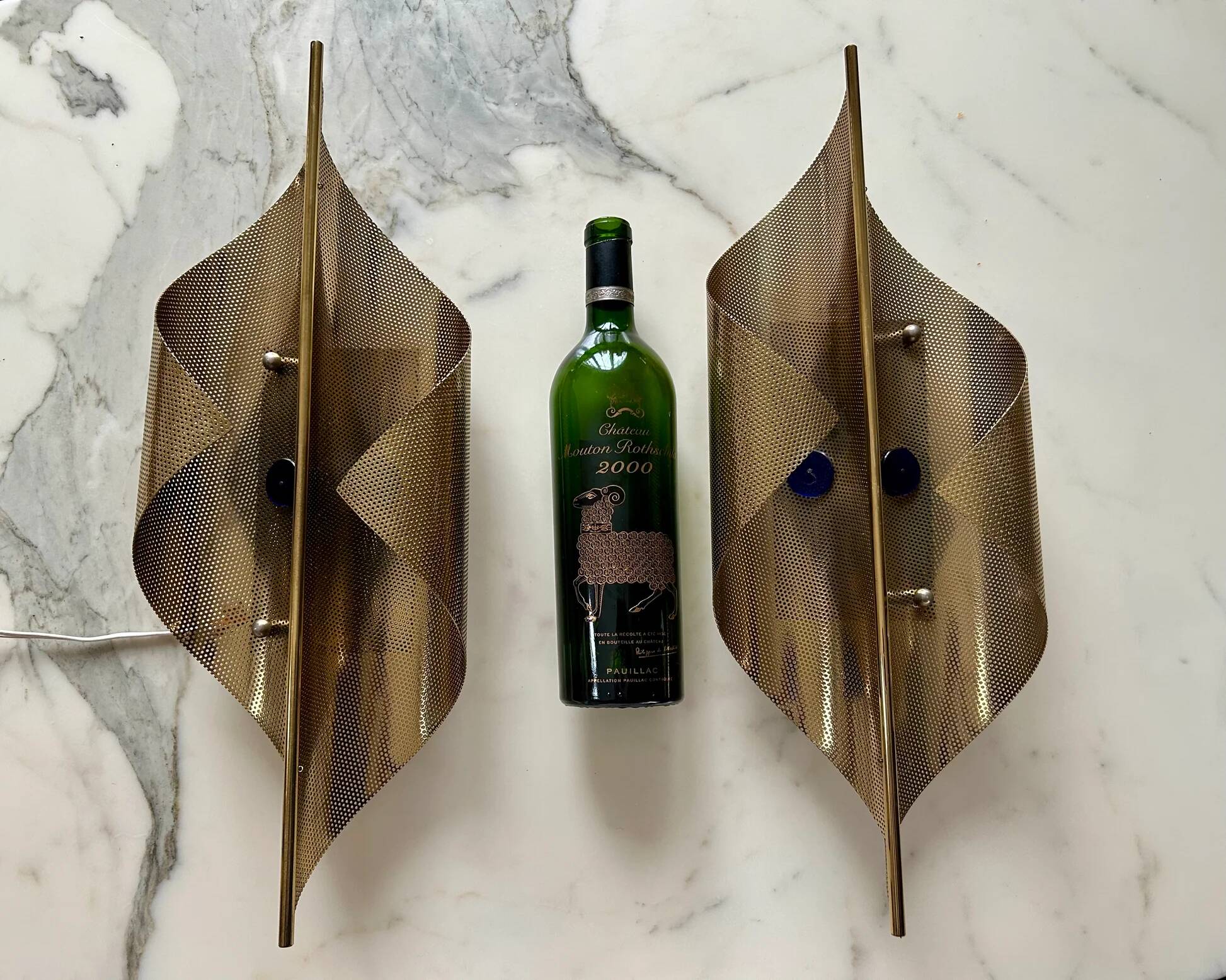 Pair of perforated brass wall lights by Christoph Palme, Germany, 1980s.