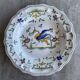 Hollow dish in glazed terracotta, signed