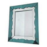Turquoise green mirror in Hollywood Regency style