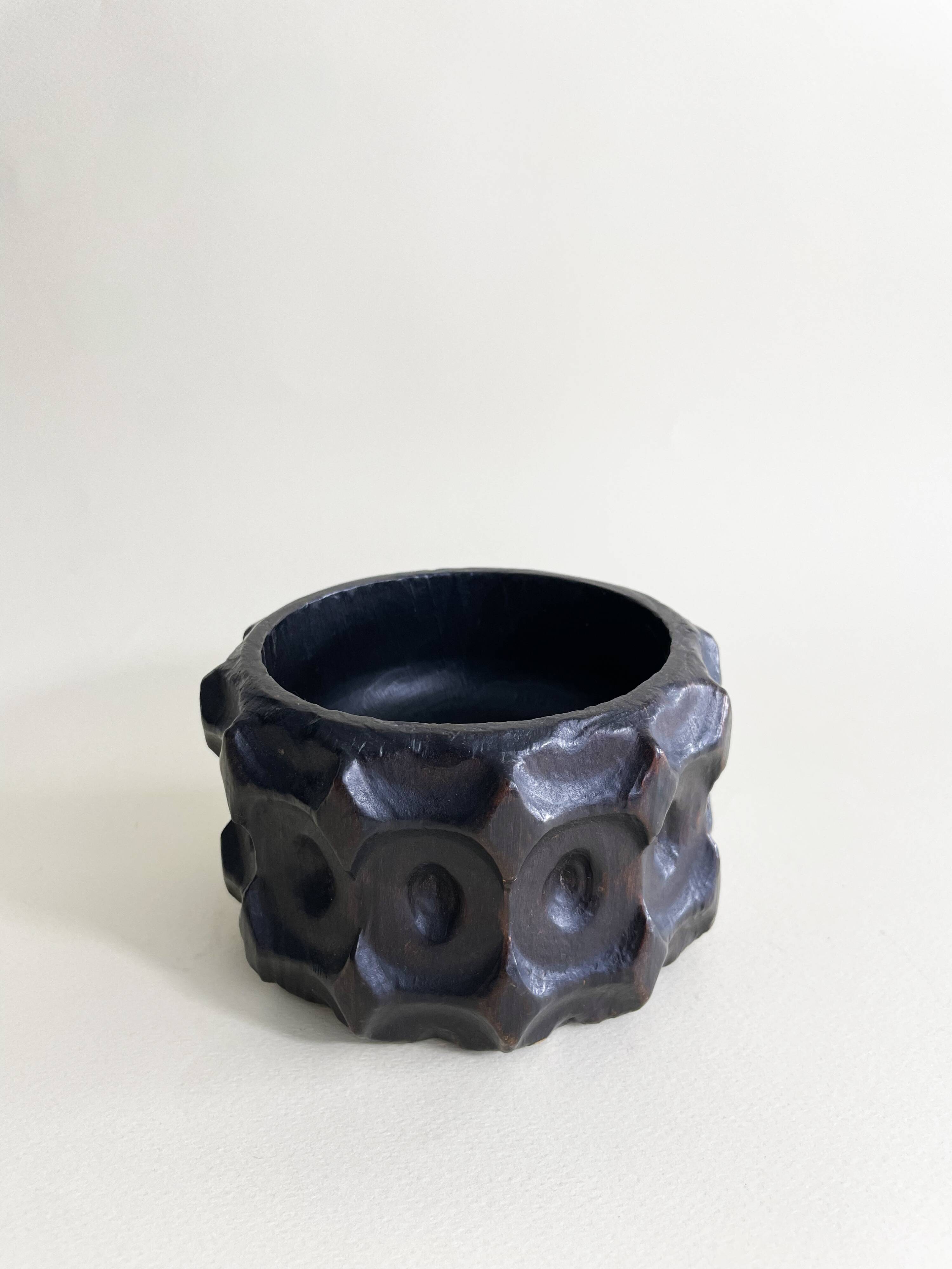 Brutalist wooden pocket emptier