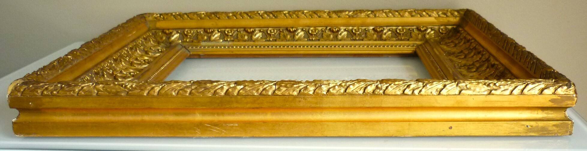 Antique gilded frame in wood and stucco, carved, original gilding
