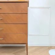 Vintage French commode from the 1950s with tapered legs and oak.