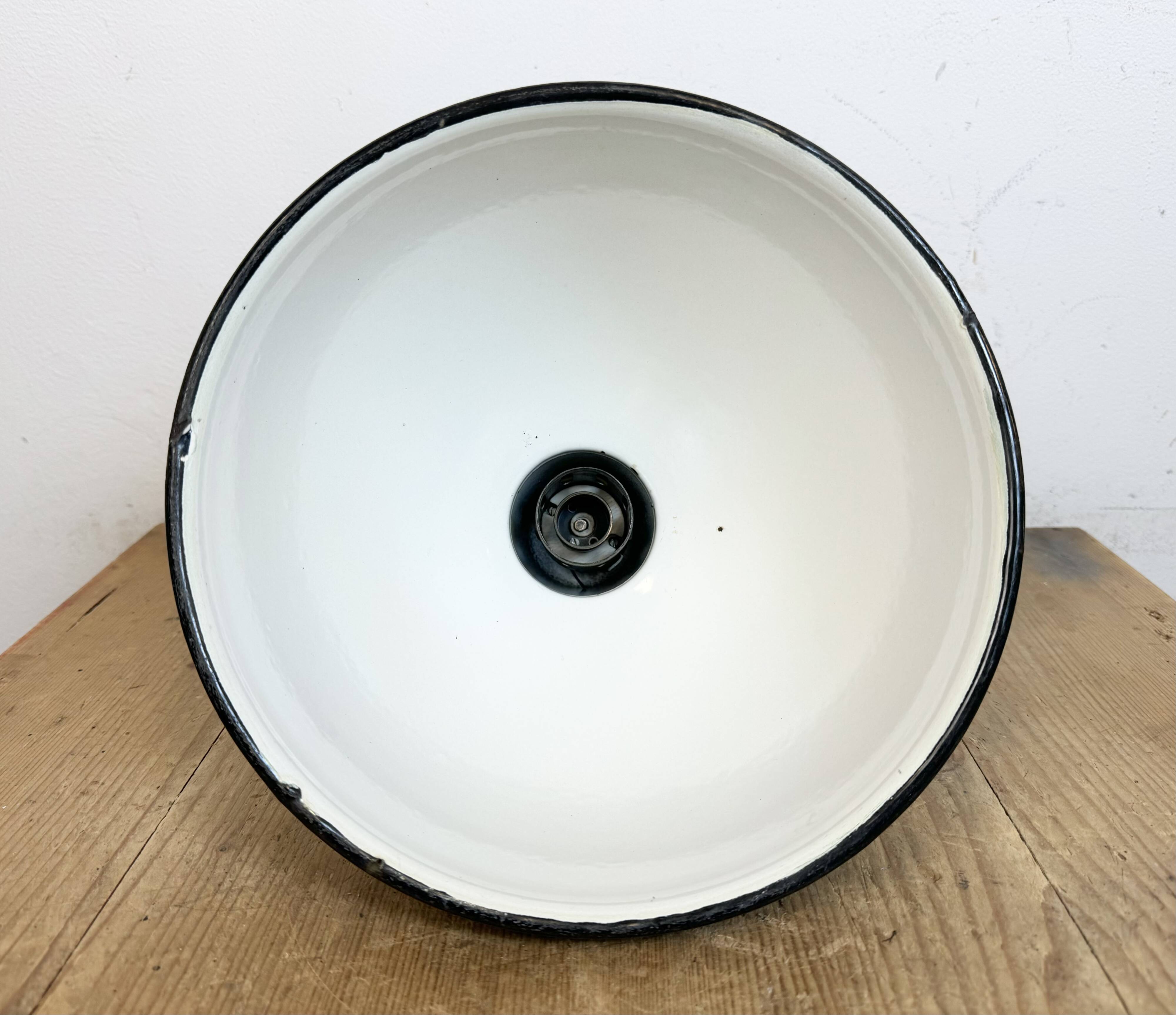 Industrial green enamel factory lamp with cast iron top, 1960s