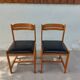 paire de chaises style scandinave, simili cuir noir