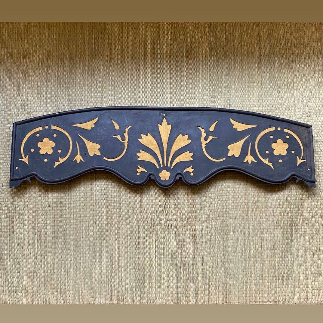 Taxes / wrought iron pediment