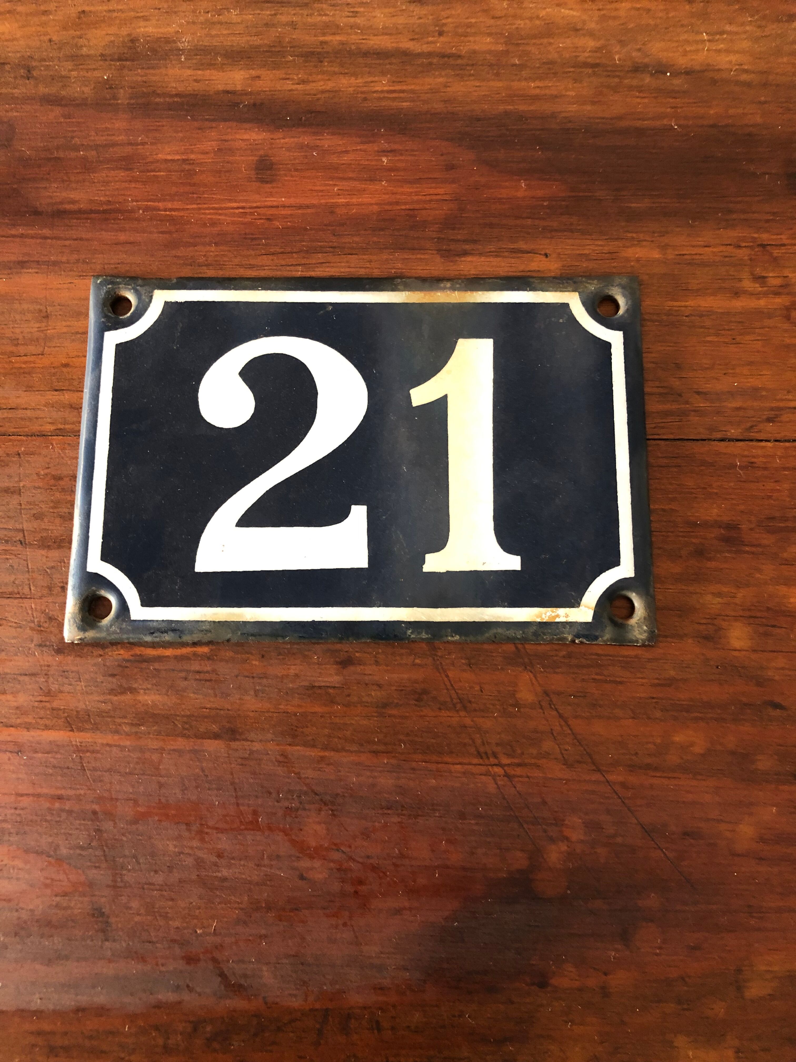 Old enamelled plate number 21