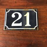 Old enamelled plate number 21