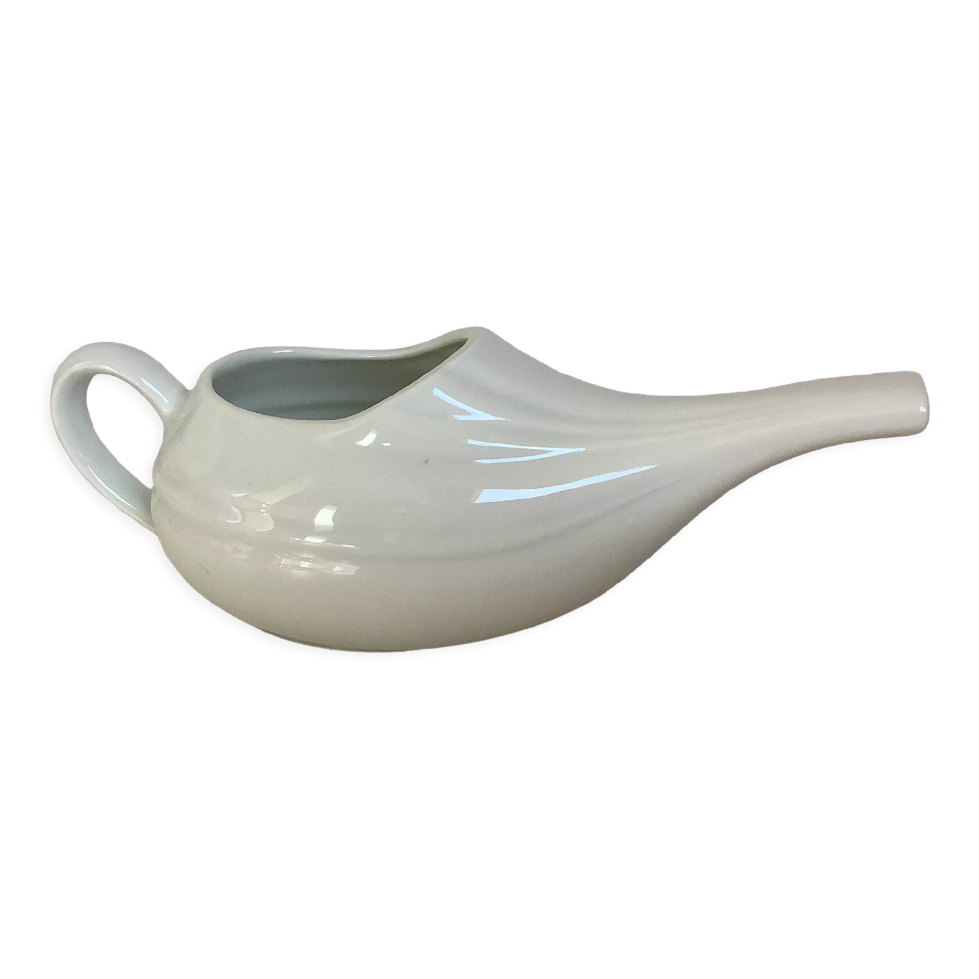 Old white porcelain baby bottle sauceboat