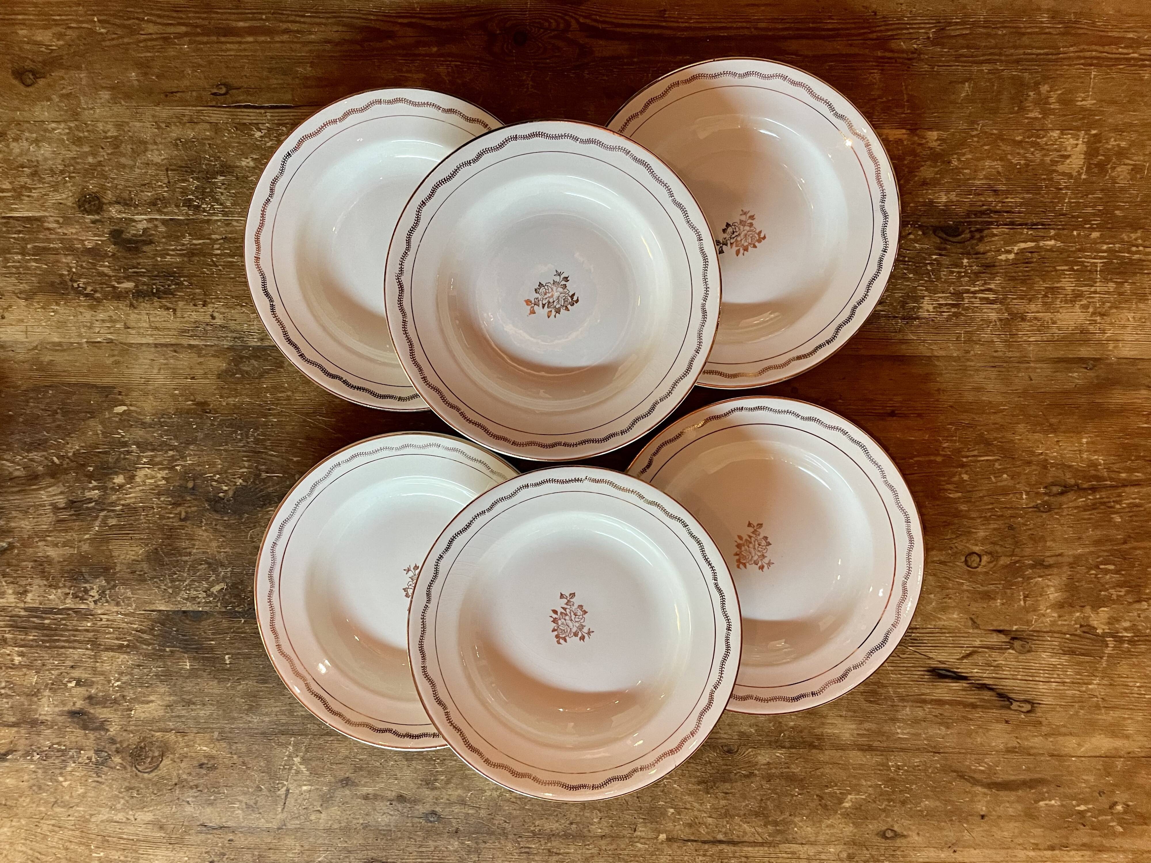 6 off-white and golden Amandinoise plates