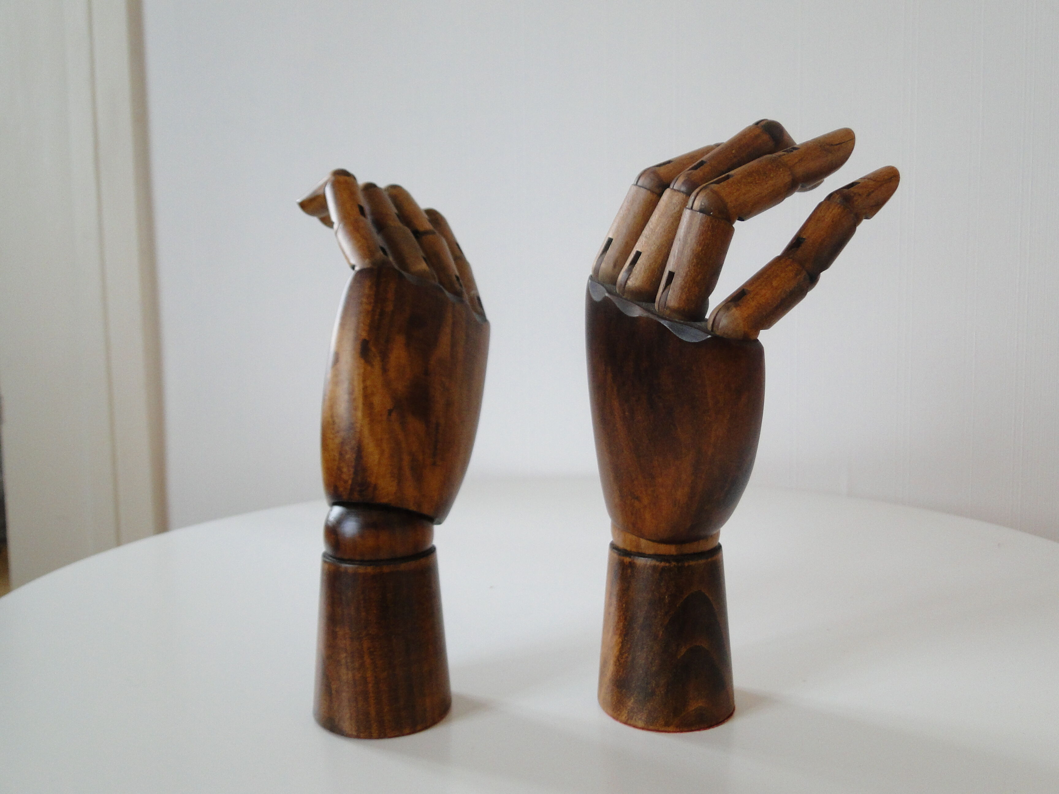 Pair of articulated wooden hands
