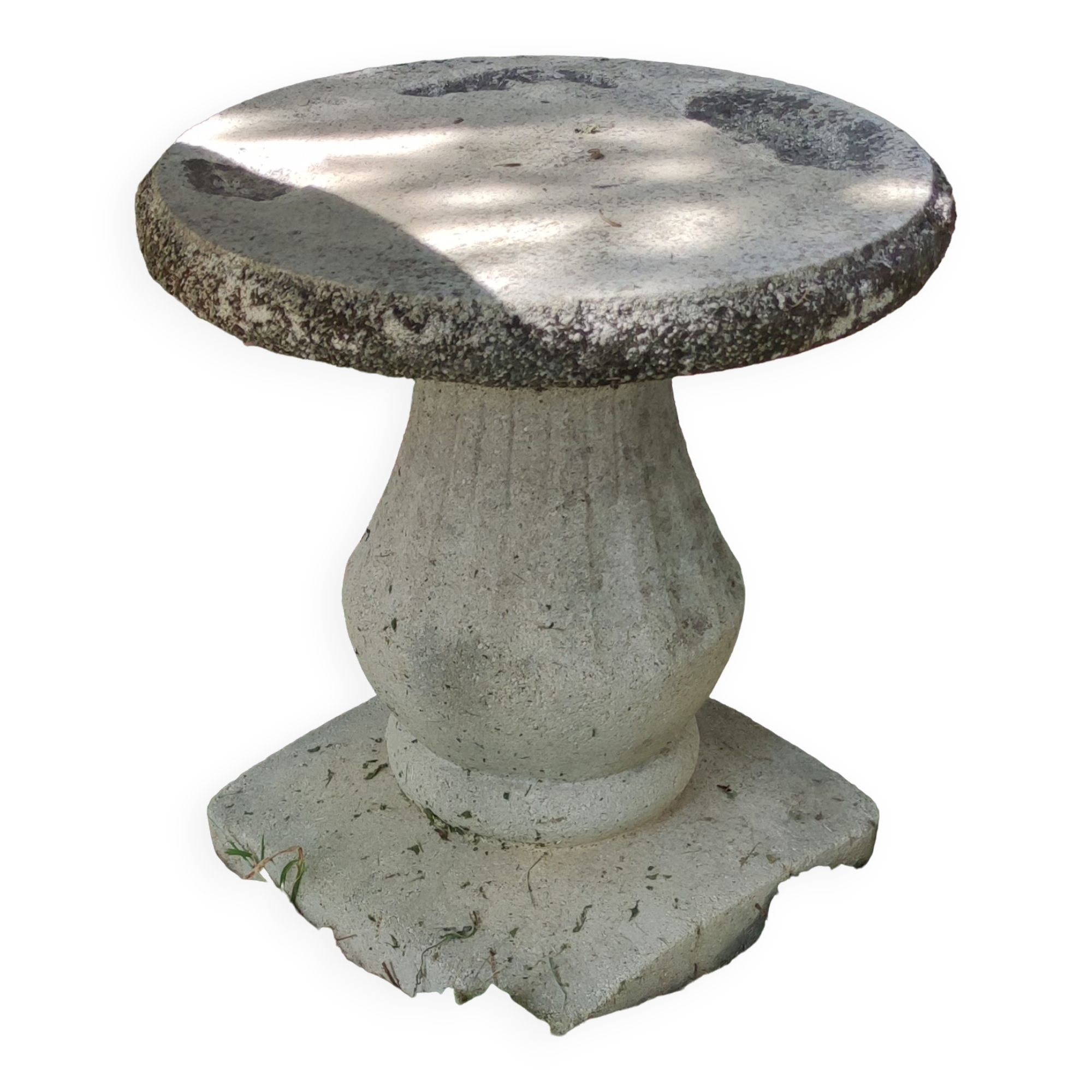 Old garden furniture in reconstituted stone