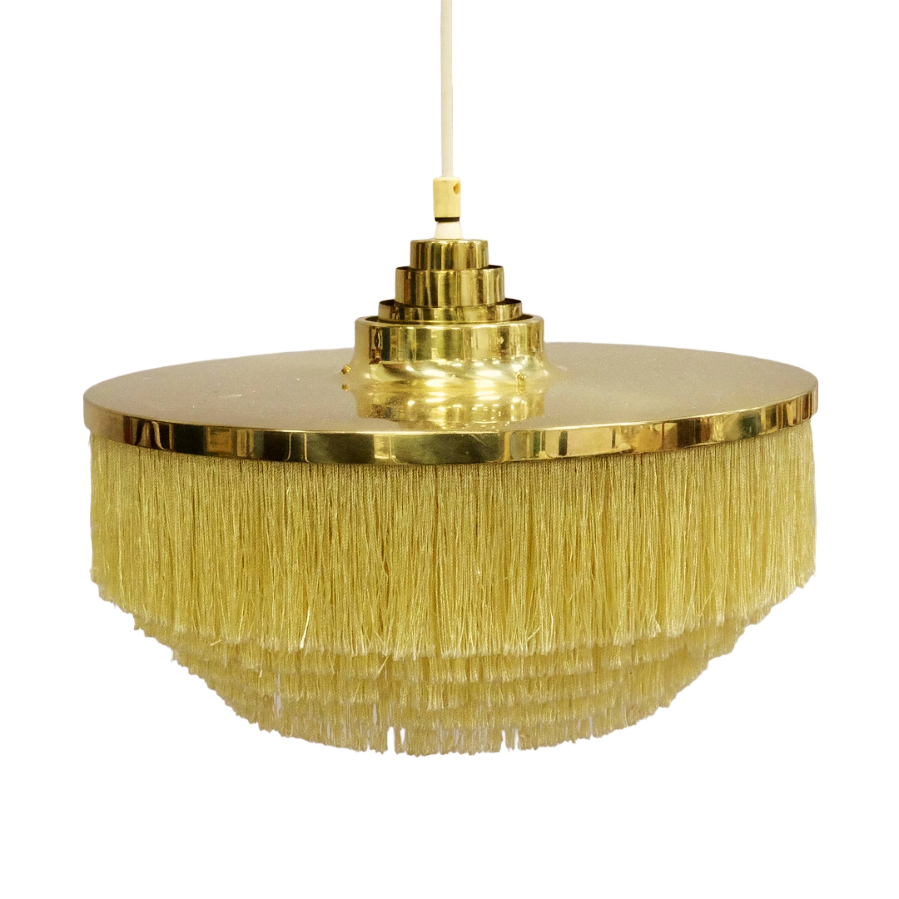 Hans-Agne Jakobsson T-603 pendant lamp in brass with yellow fringes.