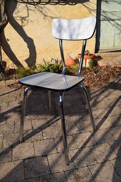 Set of table and four chairs formica