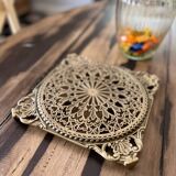 Large old brass trivet