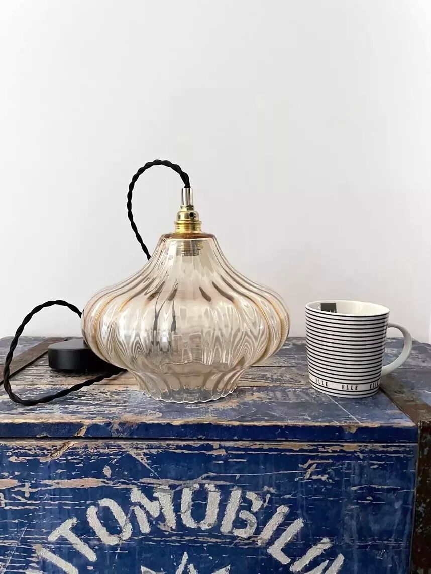 Vintage suspension lamp in amber glass