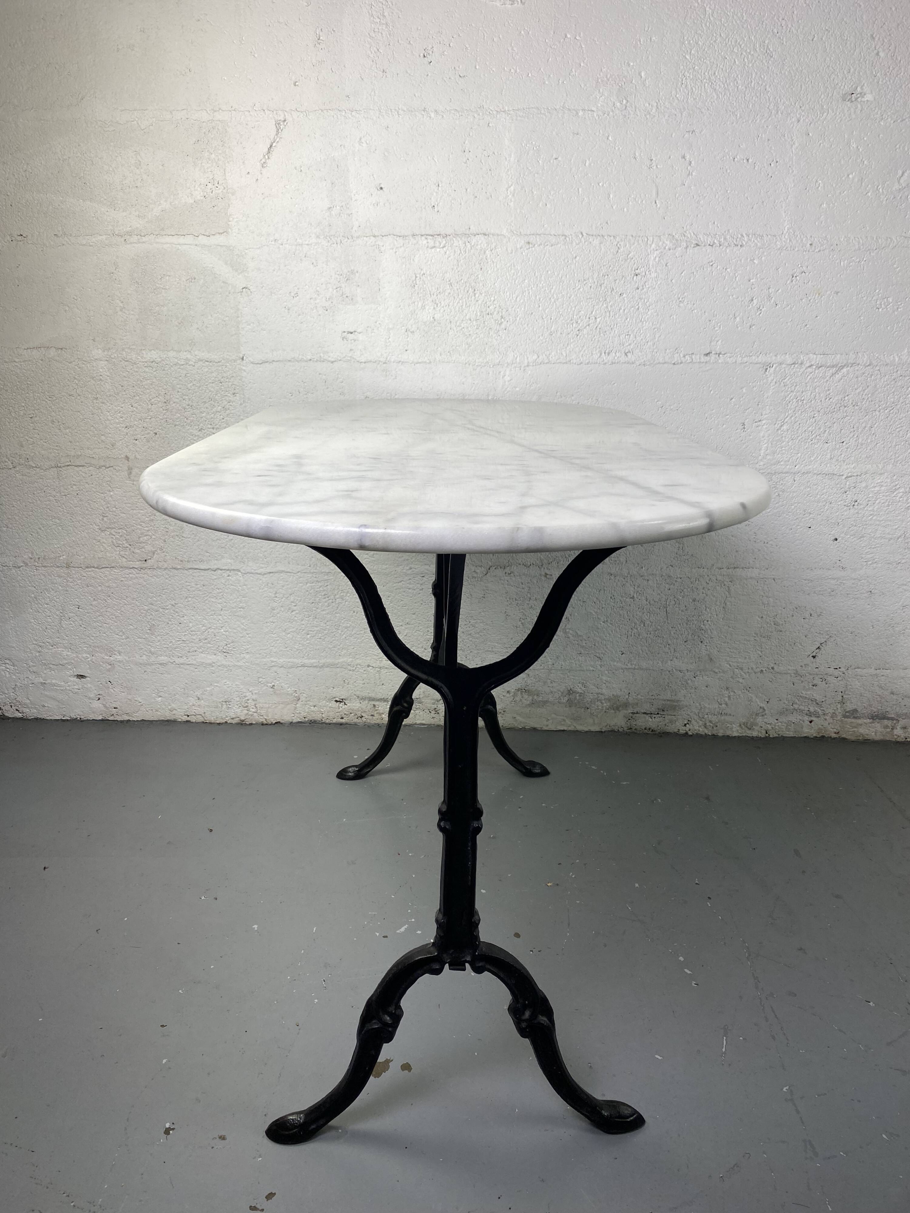 Marble and wrought iron bistro table