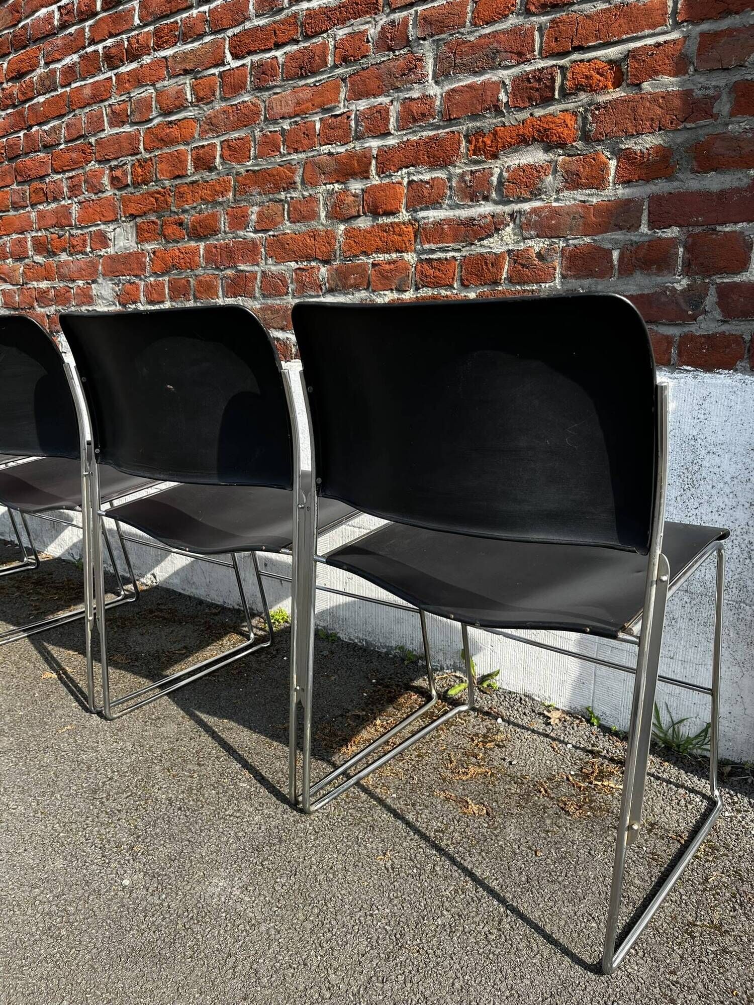 Set of 6 black metal chairs, model GF 40/4 by David Rowland.