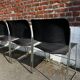 Set of 6 black metal chairs, model GF 40/4 by David Rowland.