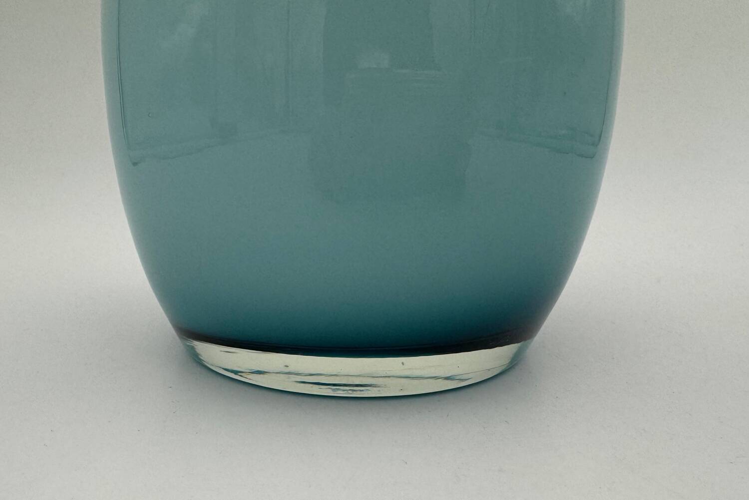 Blue lined glass bottle vase