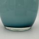 Blue lined glass bottle vase