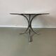 Vintage coffee table from the 70s in smoked glass and chrome, oval, Space Age style.