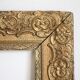 Gilded wooden and stucco frame
