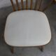 Pair of Baumann Menuet chairs, Honey patina, White skai seat