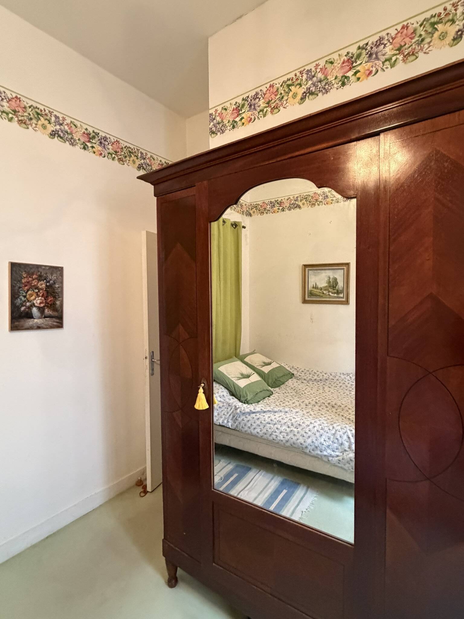 Mahogany inlaid wardrobe with a mirror