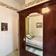 Mahogany inlaid wardrobe with a mirror