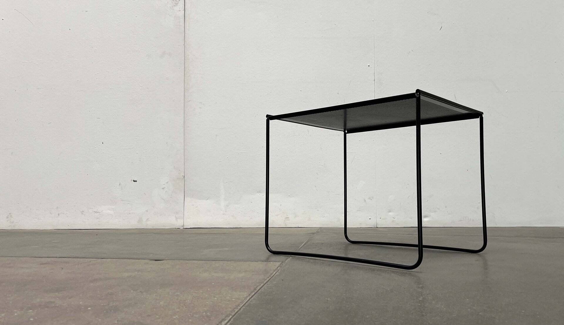 Postmodern perforated metal nesting side table from Ikea, 1980s.