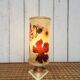 Resin lamp with inclusions of dried flowers