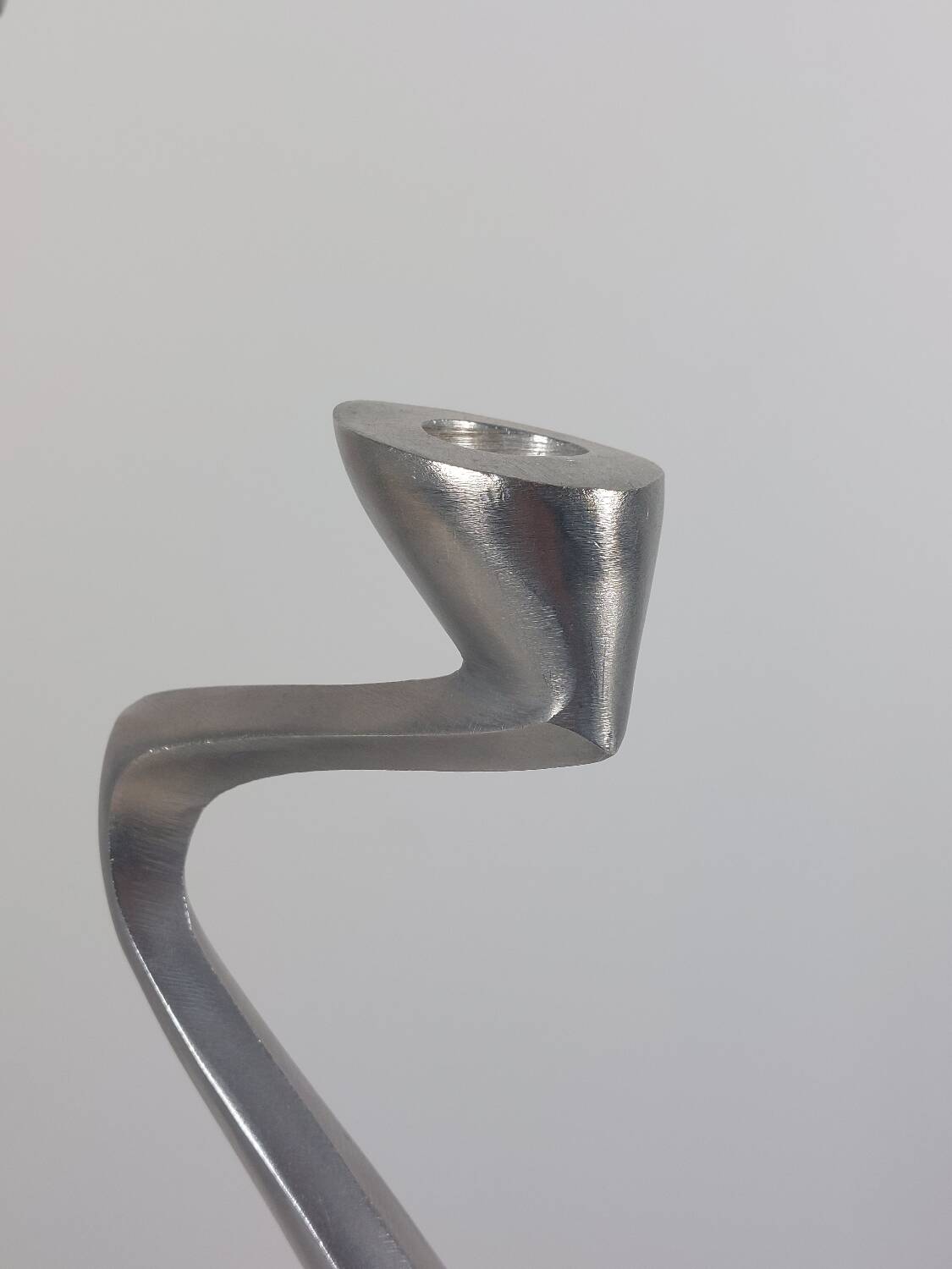 Pair of postmodern aluminium candlesticks by Matthew Hilton