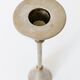 Pair of postmodern candlesticks in Memphis style made of steel and brass.