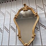 Rocaille mirror in gilded carved wood